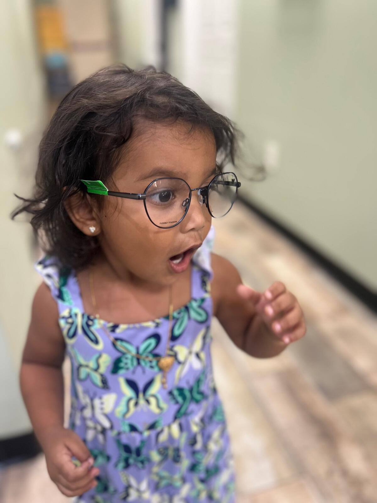 Child trying on frames